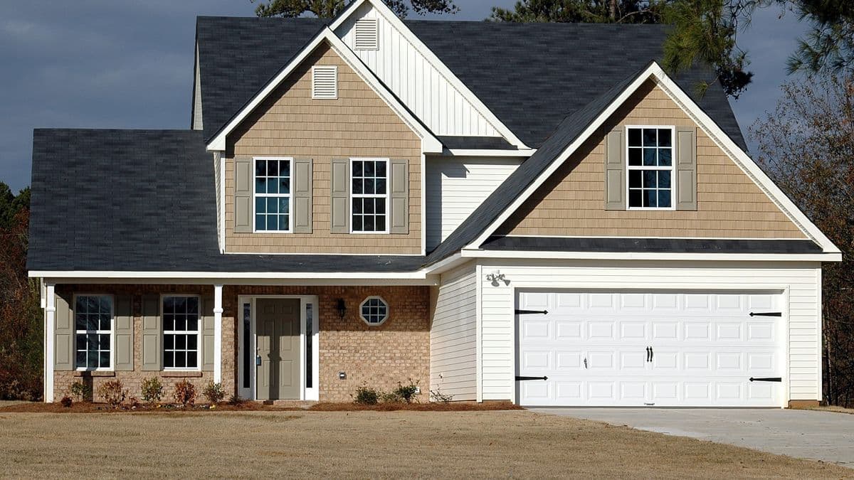 A two-story suburban house with an attached garage